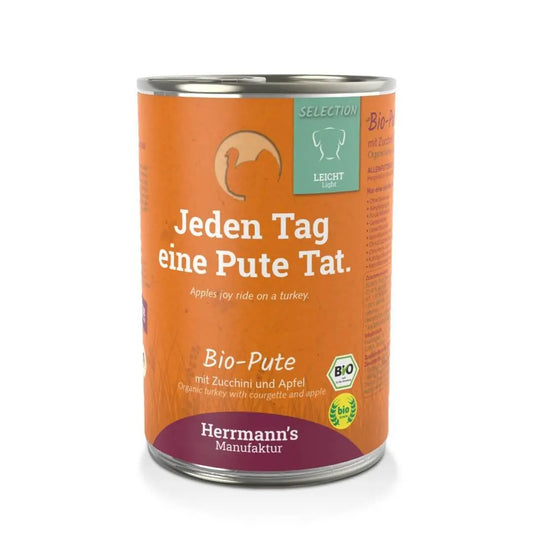 Puszka karmy dla psa Herrmann’s Selection Light Dog z bio indykiem, cukinią i jabłkiem, 400g. Etykieta z informacjami ekologiczne.
