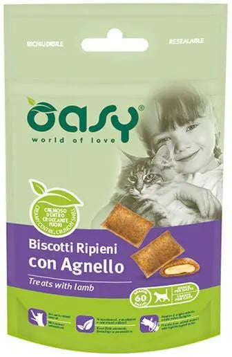 Opakowanie OASY Ciasteczka Kot - Jagnięcina 60g z wizerunkiem kota i dziecka. Przysmak z jagnięciną dla zdrowia kota.