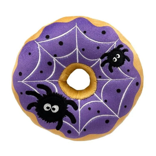 Zabawka dla psa w kształcie pączka, ozdobiona fioletową pajęczyną i czarnymi pająkami. Idealna na Halloween, miękka i wytrzymała.