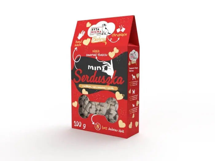 Opakowanie przysmaków dla psów Syta Micha BAKERY Mini Serduszka z królikiem 100g, czerwone pudełko z serduszkami i symbolem królika.
