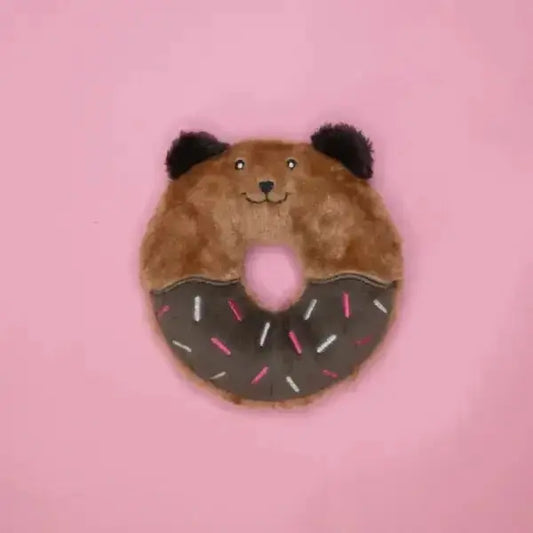 Pluszowy miś ZippyPaws Donutz Buddies na różowym tle, wyglądający jak pączek z posypką, idealny dla psów do zabawy.